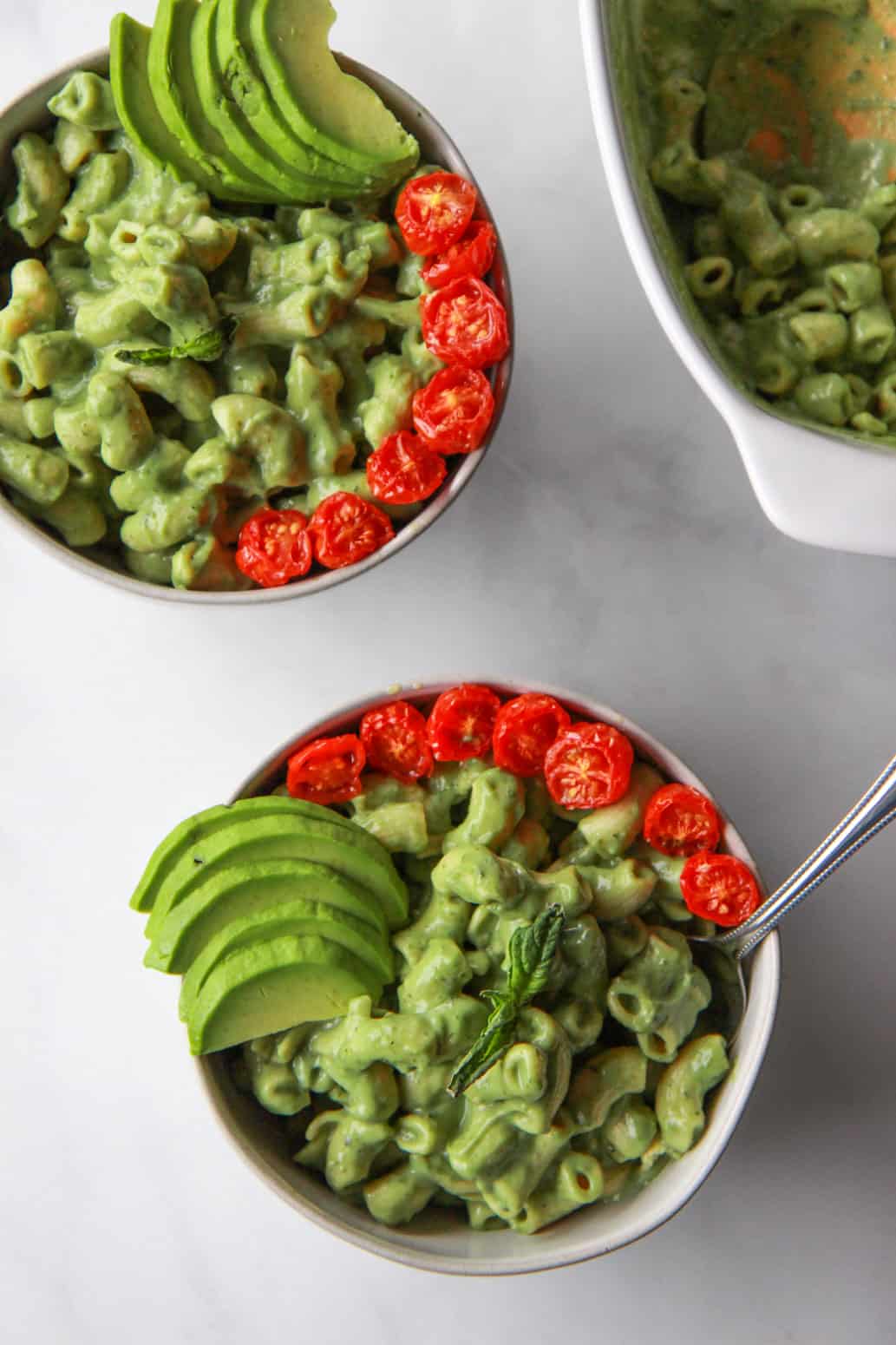 This creamy vegan avocado mac and cheese comes together in just 20 minutes. This nut-free vegan macaroni and cheese is unbelievably creamy and cheesy, due to the avocado and nutritional yeast. Gluten-free option.