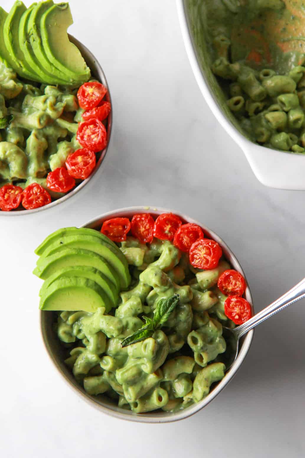 This creamy vegan avocado mac and cheese comes together in just 20 minutes. This nut-free vegan macaroni and cheese is unbelievably creamy and cheesy, due to the avocado and nutritional yeast. Gluten-free option.