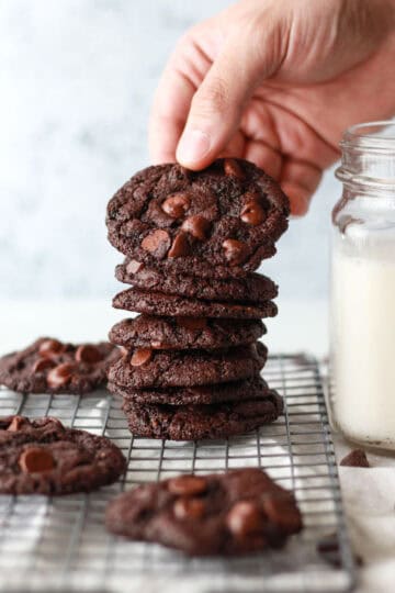 The best gluten-free, oil-free, and vegan double chocolate chip cookies that can be enjoyed in just 15 minutes and require just 7 ingredients! A one bowl vegan dessert recipe.