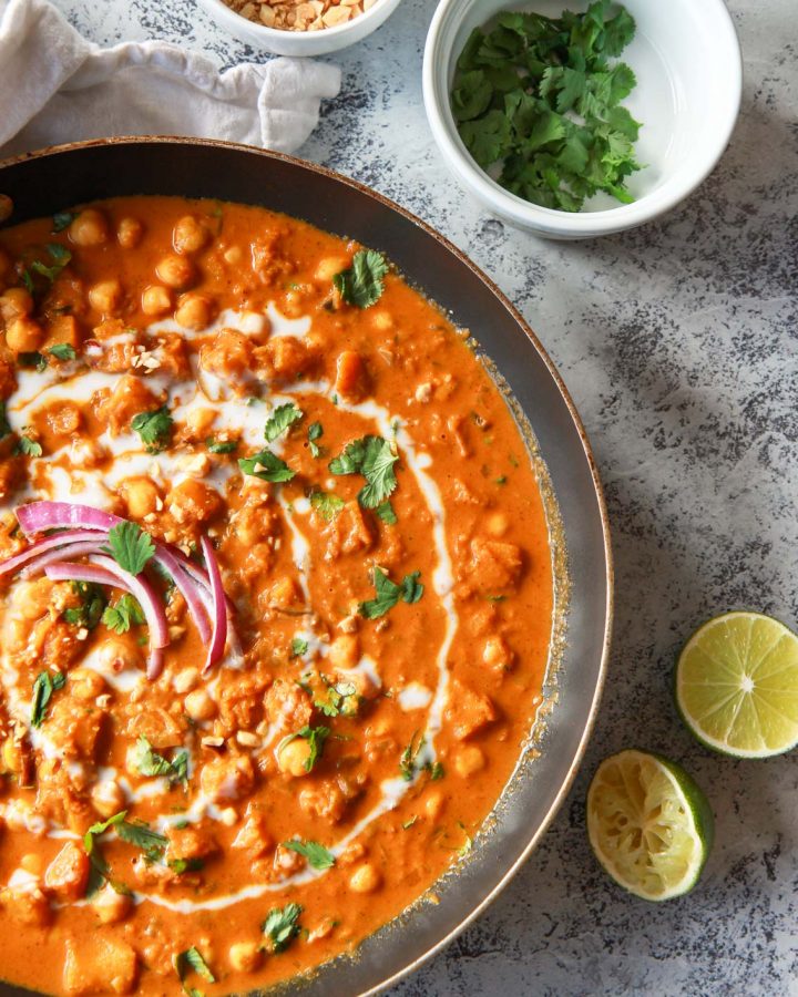 This vegan butternut squash & chickpea panang curry is a sweet, peanut flavored curry, inspired by the classic Thai dish. This vegan Thai peanut curry uses vegan panang curry paste, peanut butter, and coconut milk to create a rich and creamy base. This plant based curry uses chickpea and butternut squash instead of meat. Gluten-free with a n oil-free option.