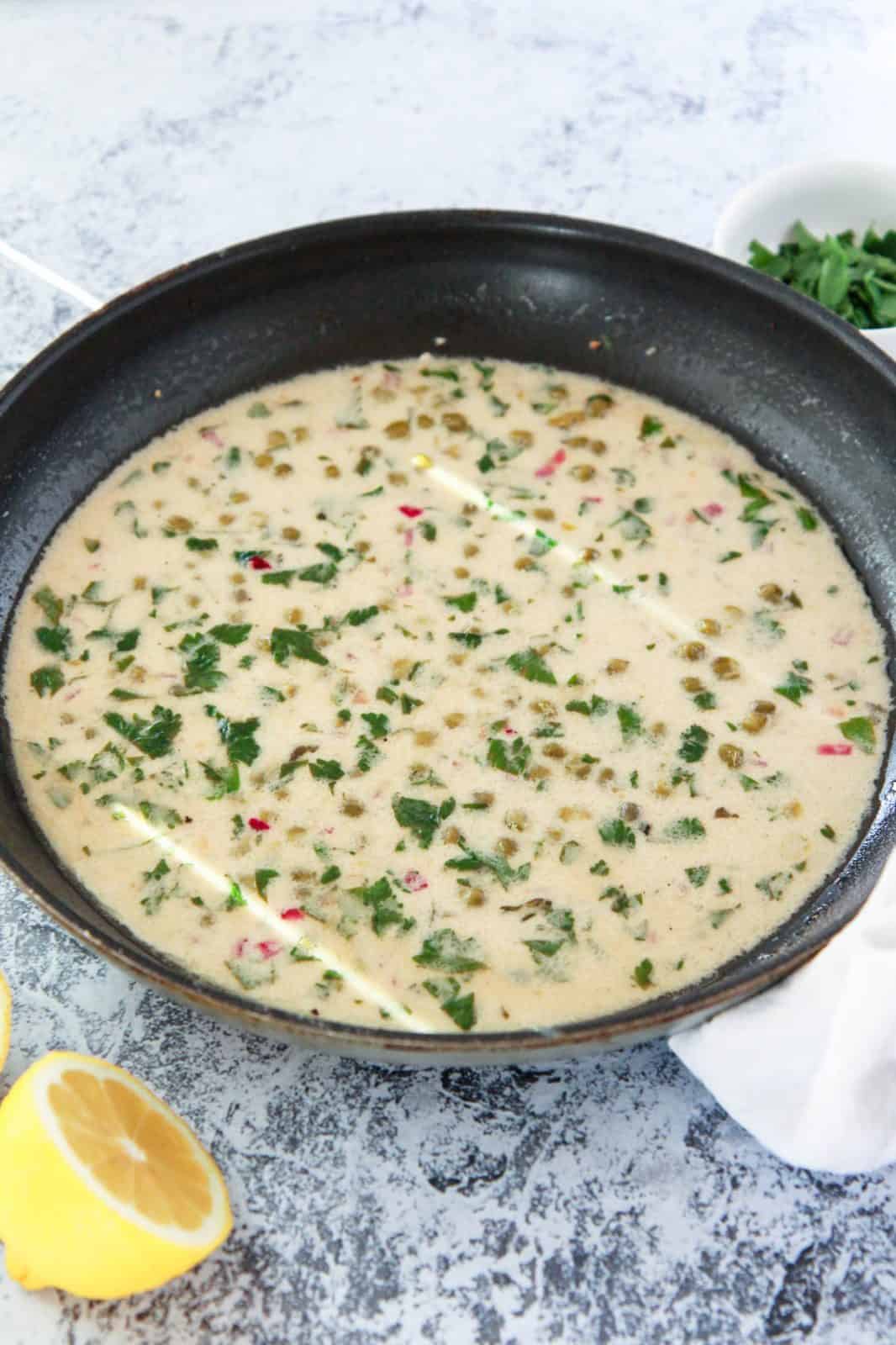 This vegan chicken piccata recipe is so close to the real thing! Homemade seitan is a protein packed, plant based meat alternative that works great in this dish. In this seitan piccata, the vegan chicken is breaded and served over pasta in a light, creamy, lemon caper sauce.