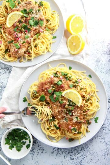 This vegan chicken piccata recipe is so close to the real thing! Homemade seitan is a protein packed, plant based meat alternative that works great in this dish. In this seitan piccata, the vegan chicken is breaded and served over pasta in a light, creamy, lemon caper sauce.