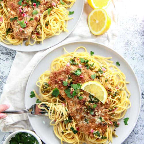 This vegan chicken piccata recipe is so close to the real thing! Homemade seitan is a protein packed, plant based meat alternative that works great in this dish. In this seitan piccata, the vegan chicken is breaded and served over pasta in a light, creamy, lemon caper sauce.