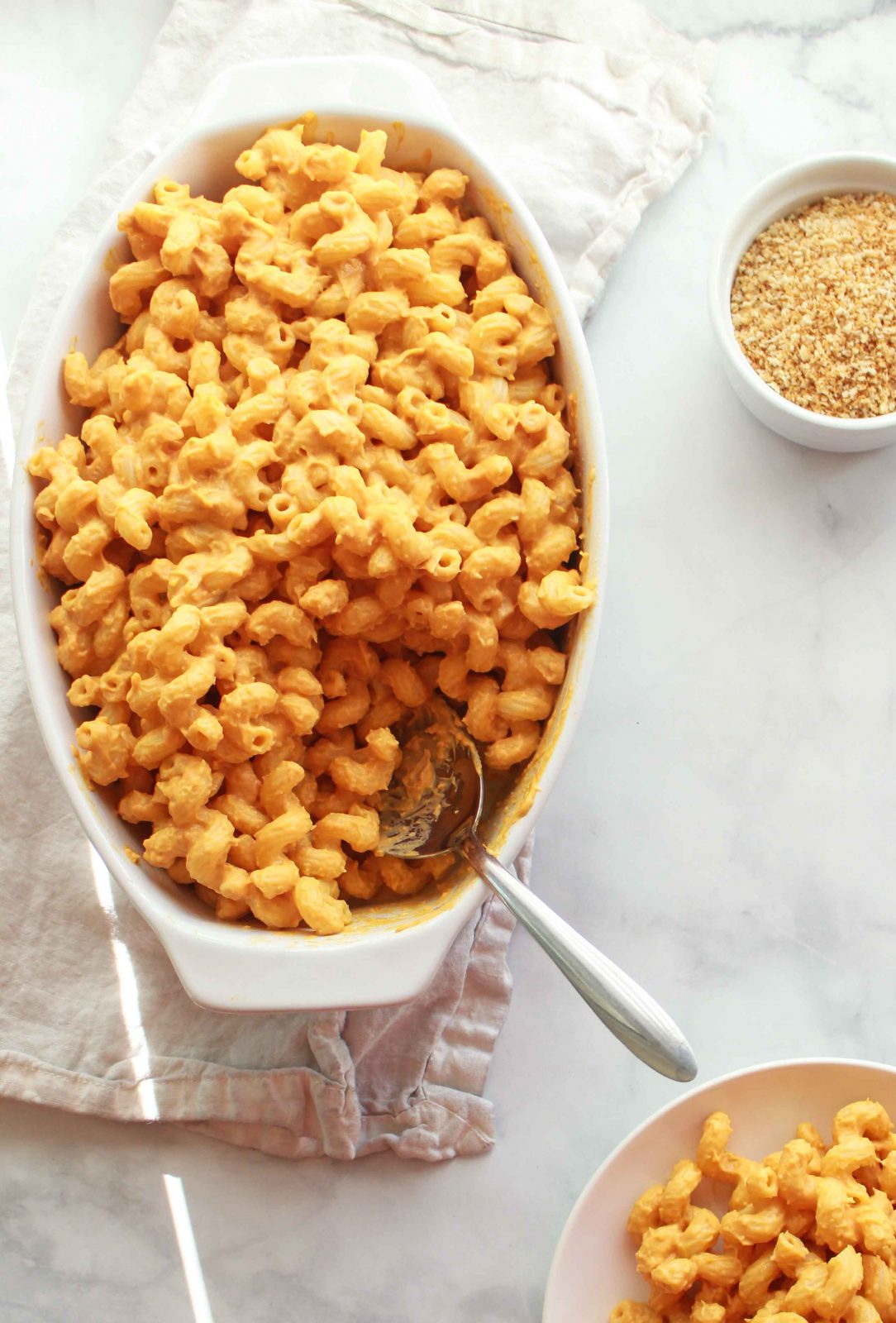 This vegan sweet potato mac and cheese is gluten free, nut free, and a delicious side dish for the holidays.