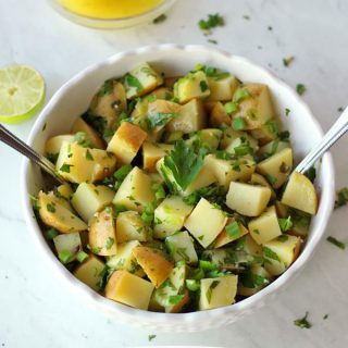 This light mediterranean potato salad is a healthy alternative to traditional potato salad, with a lemon herb dressing. This healthy mediterranean potato salad recipe is vegan and gluten-free, only 7 ingredients, and dressed with lemon, olive oil, and fresh herbs.