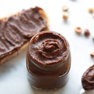 How to make healthy vegan Nutella. This vegan chocolate hazelnut spread recipe is date sweetened with a raw option.