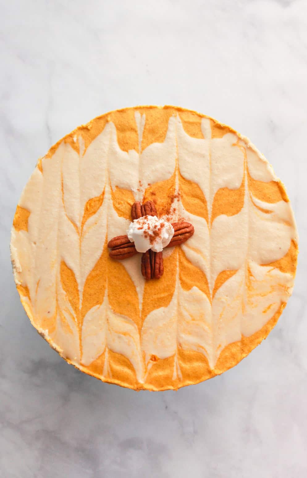 This no bake vegan pumpkin cheesecake is a decadent raw and gluten free dessert, perfect for the busy holidays as it just sets in the freezer!