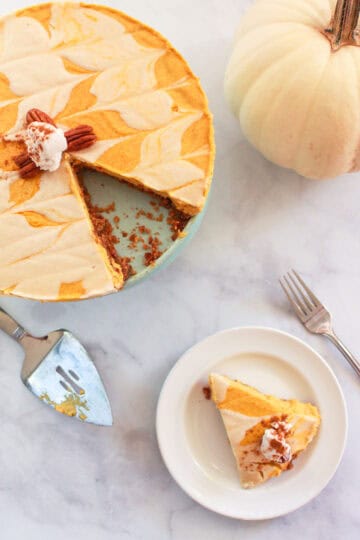 This no bake vegan pumpkin cheesecake is a decadent raw and gluten free dessert, perfect for the busy holidays as it just sets in the freezer!