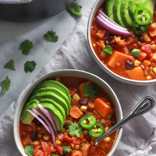 This warming lentil and sweet potato chili is the perfect comfort food for colder months. Packed full of flavor, this vegan sweet potato chili recipe is also gluten-free.