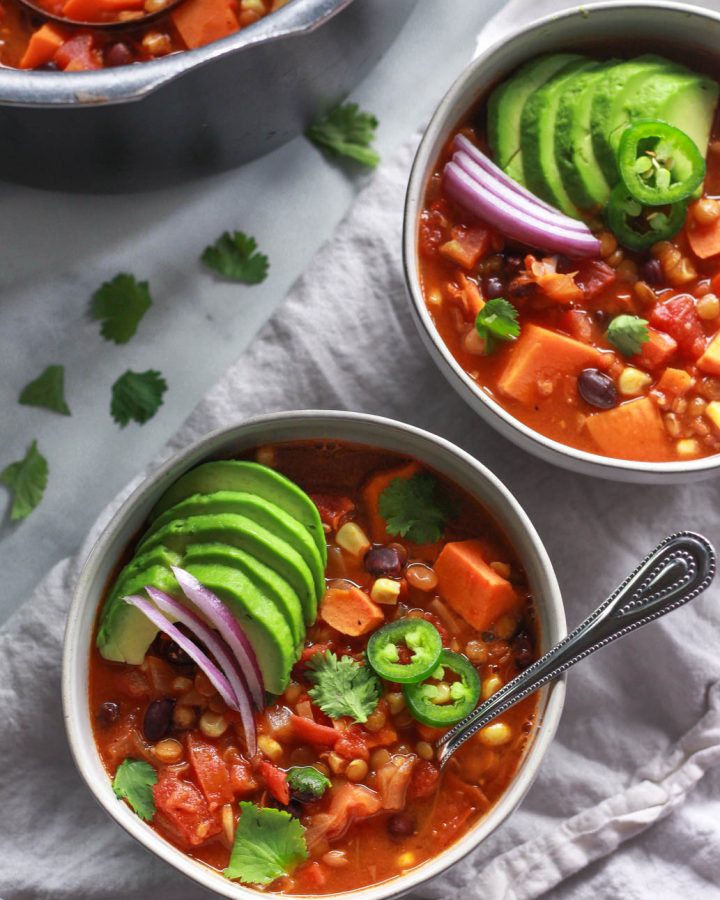 This warming lentil and sweet potato chili is the perfect comfort food for colder months. Packed full of flavor, this vegan sweet potato chili recipe is also gluten-free.