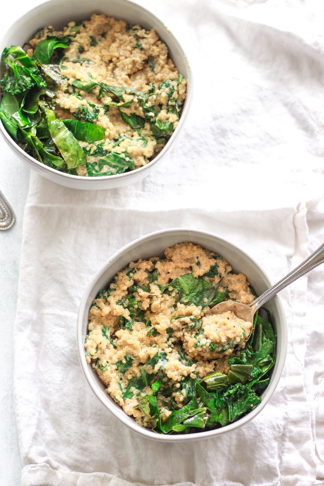 This savory, creamy quinoa and greens is a versatile side dish, but also filling enough to be a main. Coconut milk adds creaminess to this flavorful savory quinoa dish. This creamy coconut quinoa and greens is packed with umami flavor and protein!