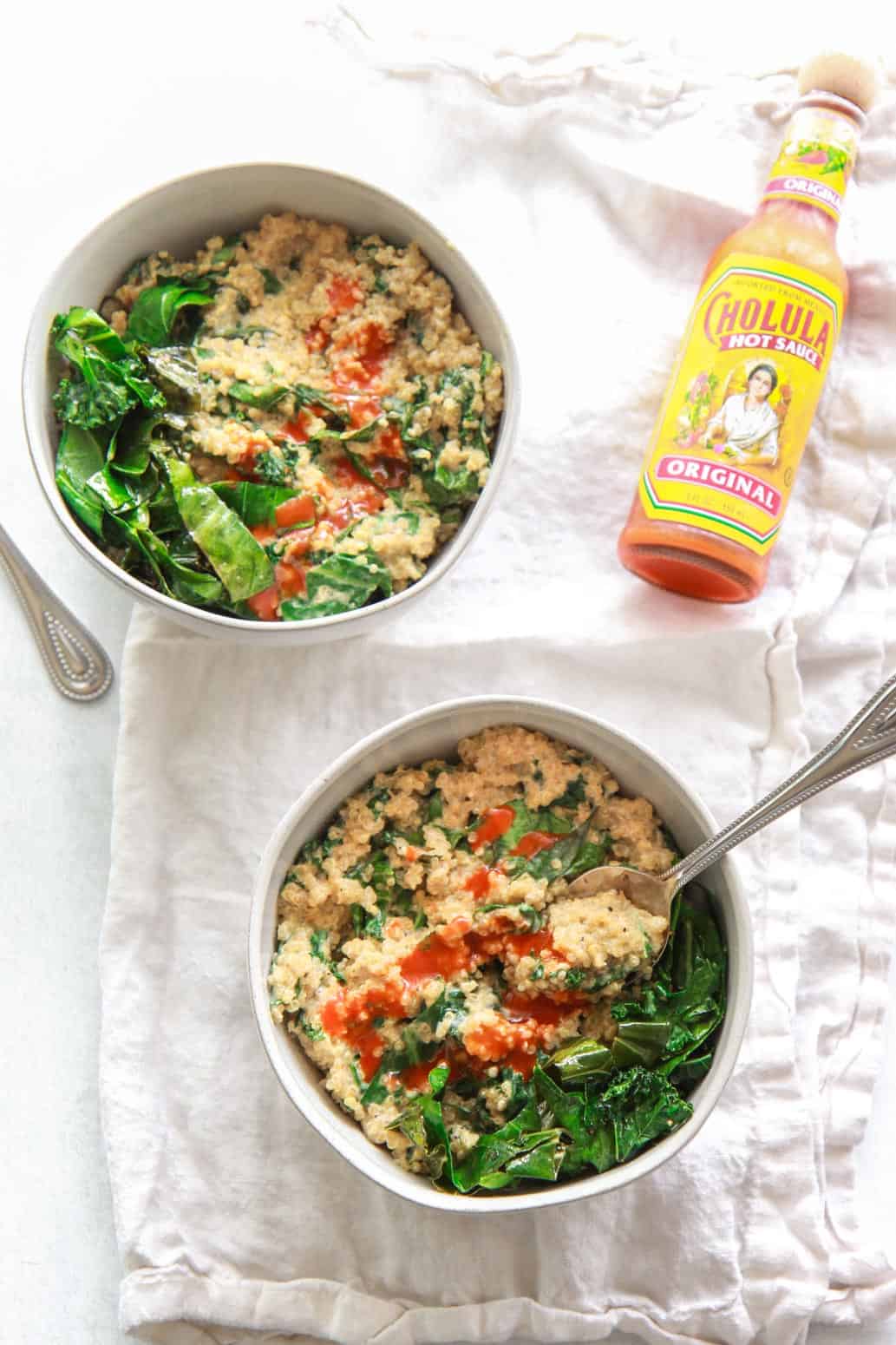 This savory, creamy quinoa and greens is a versatile side dish, but also filling enough to be a main. Coconut milk adds creaminess to this flavorful savory quinoa dish. This creamy coconut quinoa and greens is packed with umami flavor and protein!