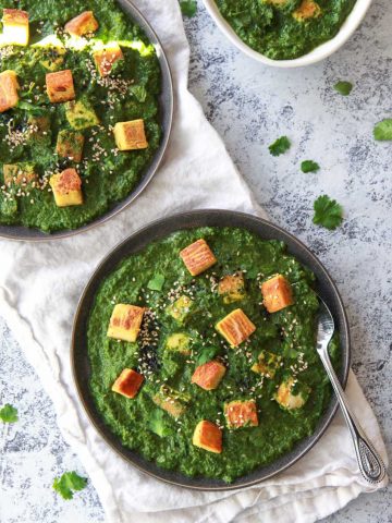 This vegan palak paneer replaces the paneer with a recipe for Burmese chickpea tofu, replicating the texture and flavor of a soft cheese. This vegan saag paneer, a spinach curry, is made creamy with coconut milk, making a rich and flavor Indian-inspired comfort dish.