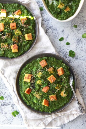 This vegan palak paneer replaces the paneer with a recipe for Burmese chickpea tofu, replicating the texture and flavor of a soft cheese. This vegan saag paneer, a spinach curry, is made creamy with coconut milk, making a rich and flavor Indian-inspired comfort dish.