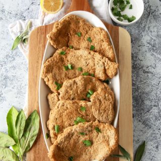 These seitan chicken cutlets are easy and versatile. A vegan meat replacement, these seitan chicken breasts are simmered and done in under an hour. This plant based chicken alternative recipe is made from vital wheat gluten, packed with protein, and flavored with savory herbs.