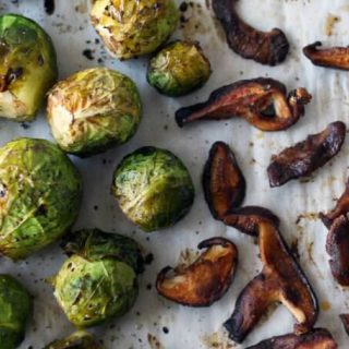 These vegan brussels sprouts with shiitake bacon and maple dijon dip make a delicious holiday side dish.