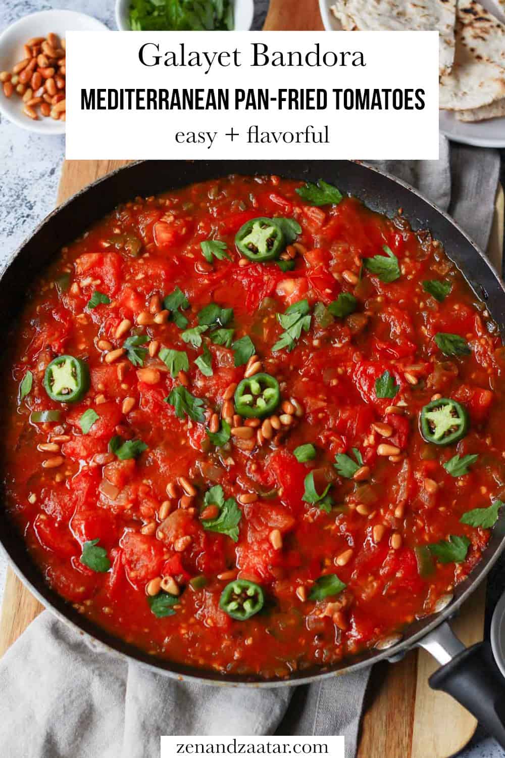 A close-up of the galayet bandora dish that reads Galayet Bandora: Mediterranean Pan-Fried Tomatoes (easy + flavorful).