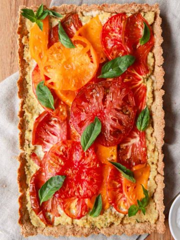 Vegan tomato tart with basil cashew ricotta and a gluten free tart crust