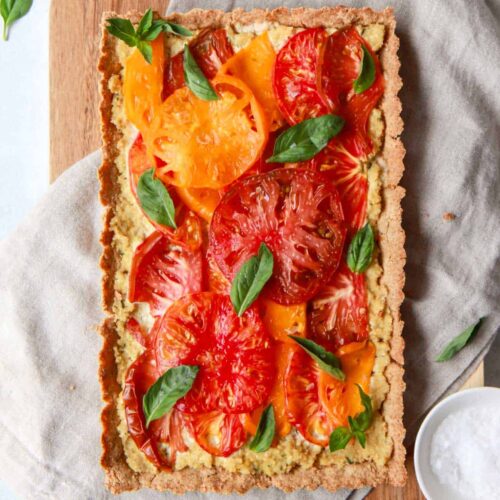 Vegan tomato tart with basil cashew ricotta and a gluten free tart crust