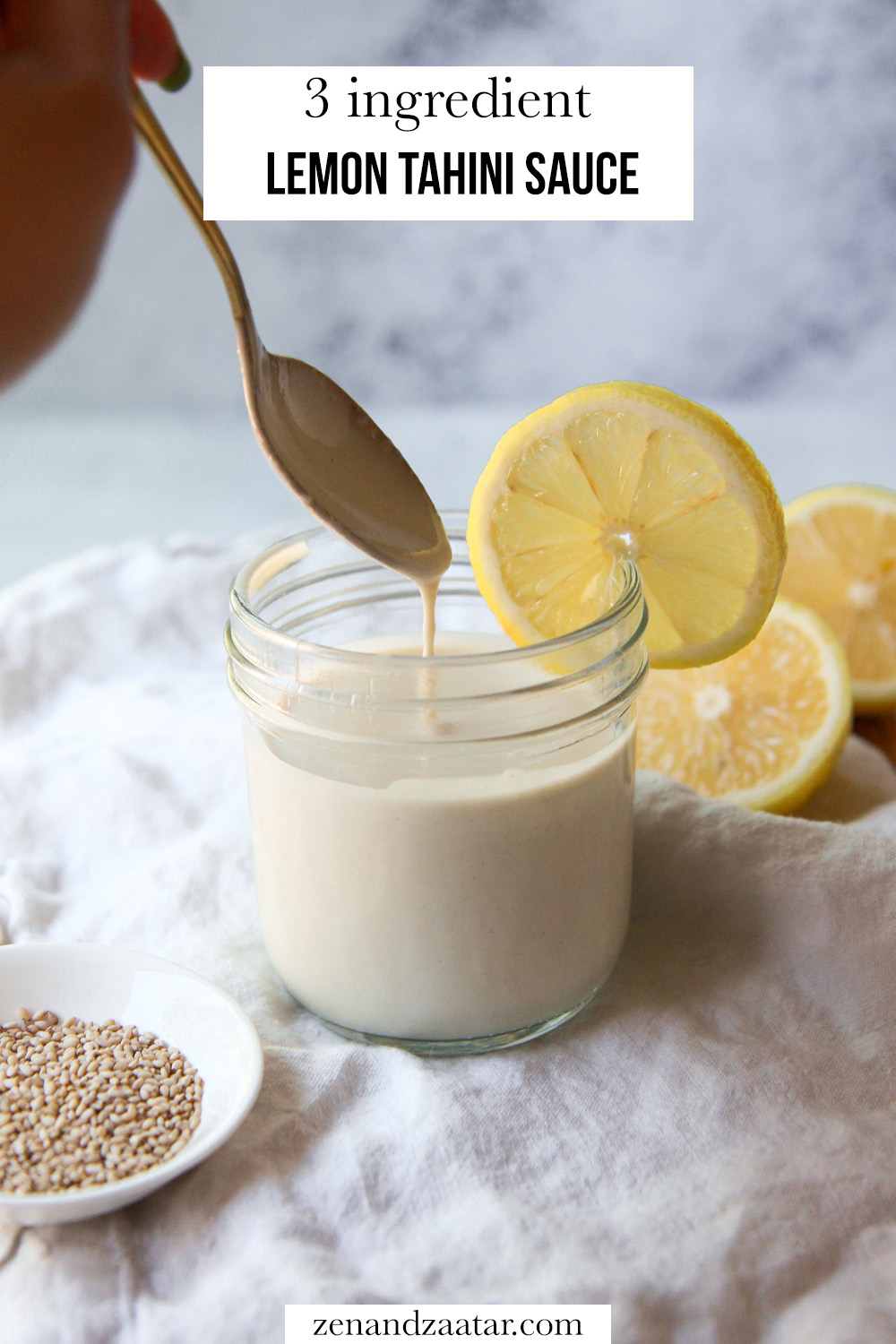 Image of the tahini sauce being drizzled with text, "3-ingredient lemon tahini sauce."