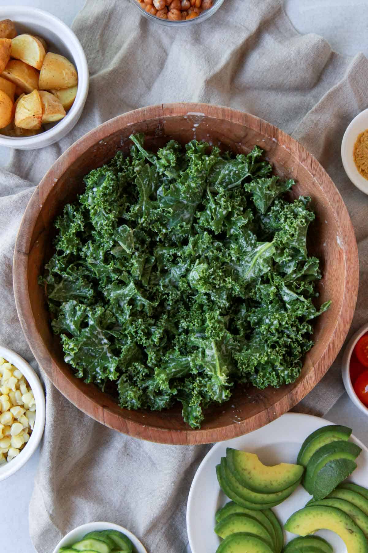 The kale after being massaged with the tahini dressing.