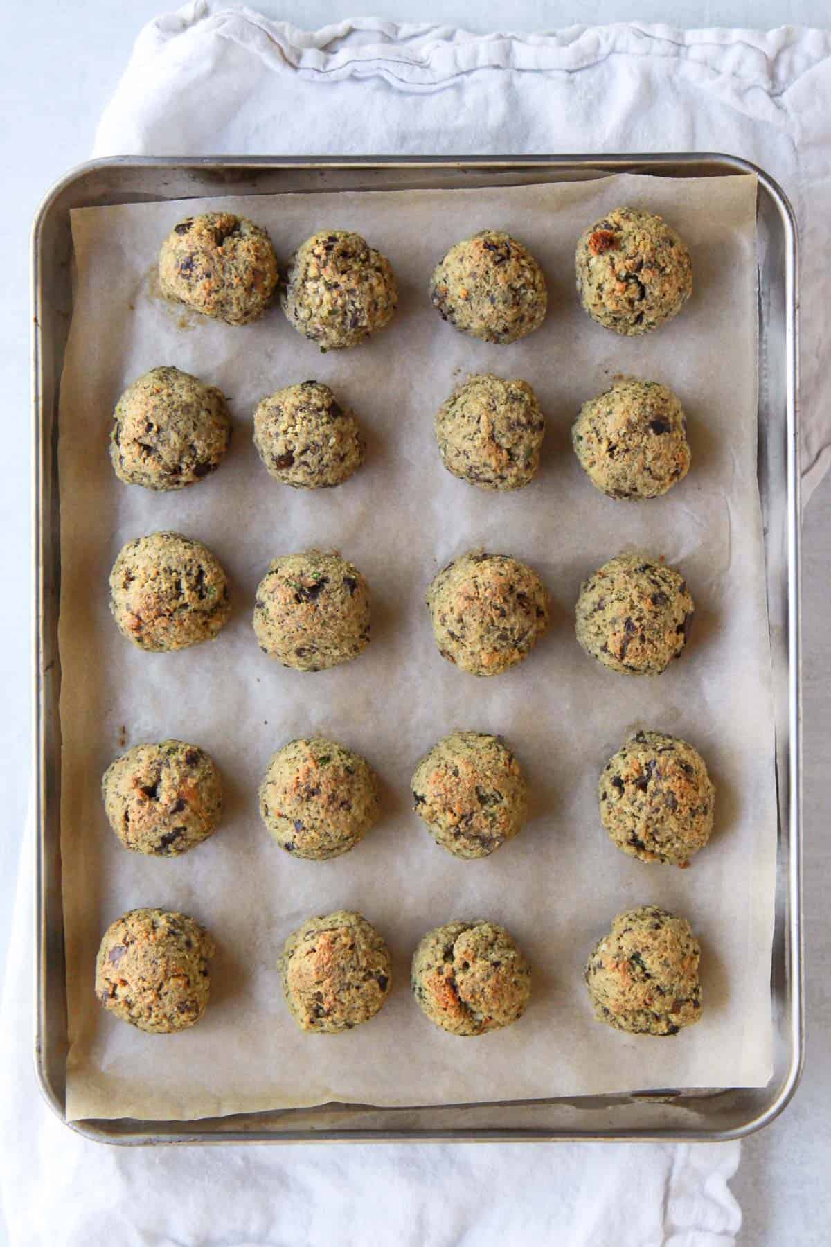 The baked eggplant meatballs after being taken out of the oven.