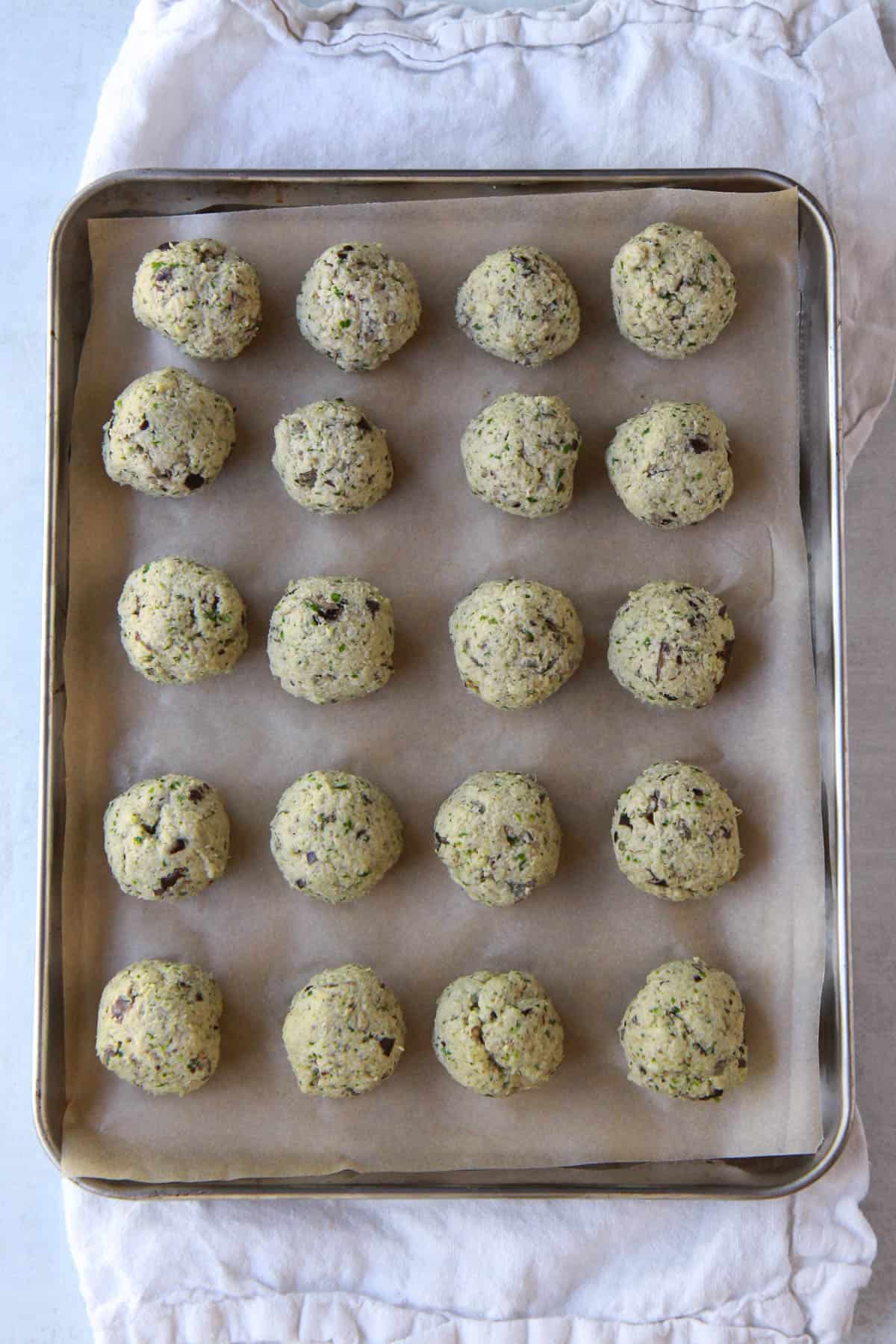 Shaped eggplant meatballs before going into the oven.