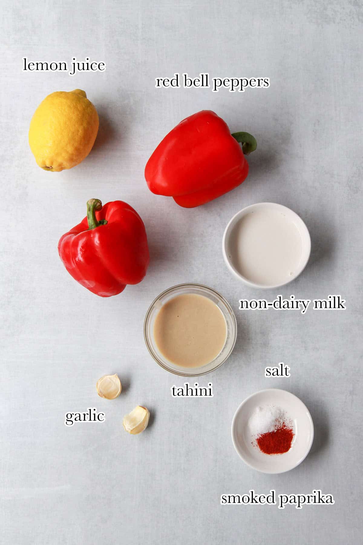 The ingredients for the creamy roasted red pepper sauce laid out and labeled.