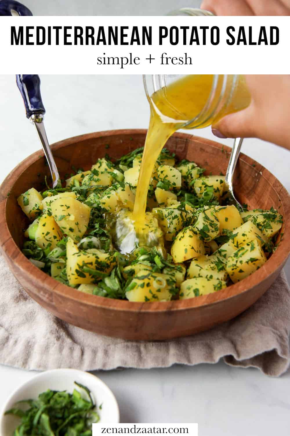 Dressing pouring over Mediterranean potato salad with text overlay, "Mediterranean potato salad: simple + fresh".