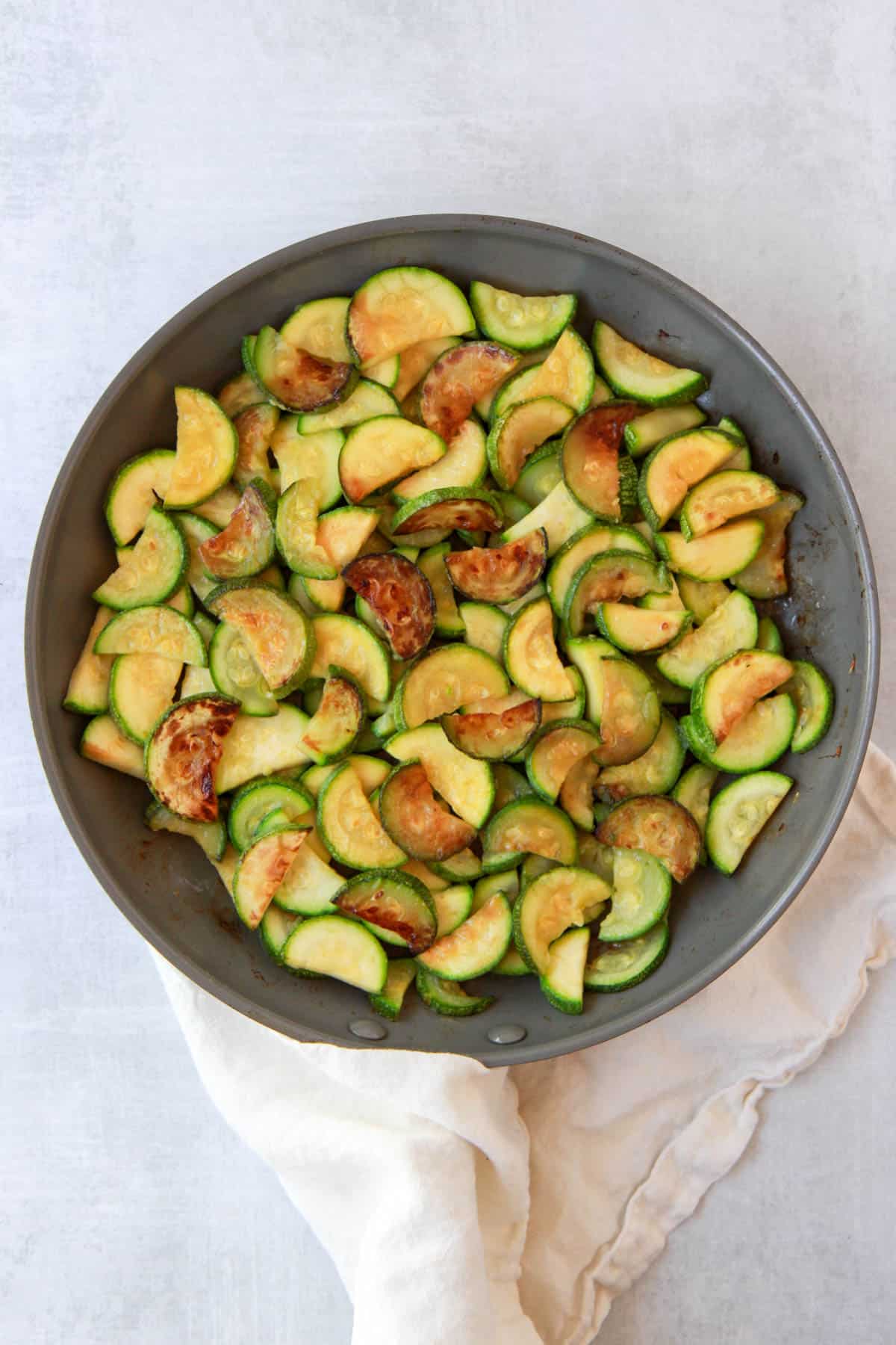 Image showing the Arabic zucchini or squash browning in skillet.