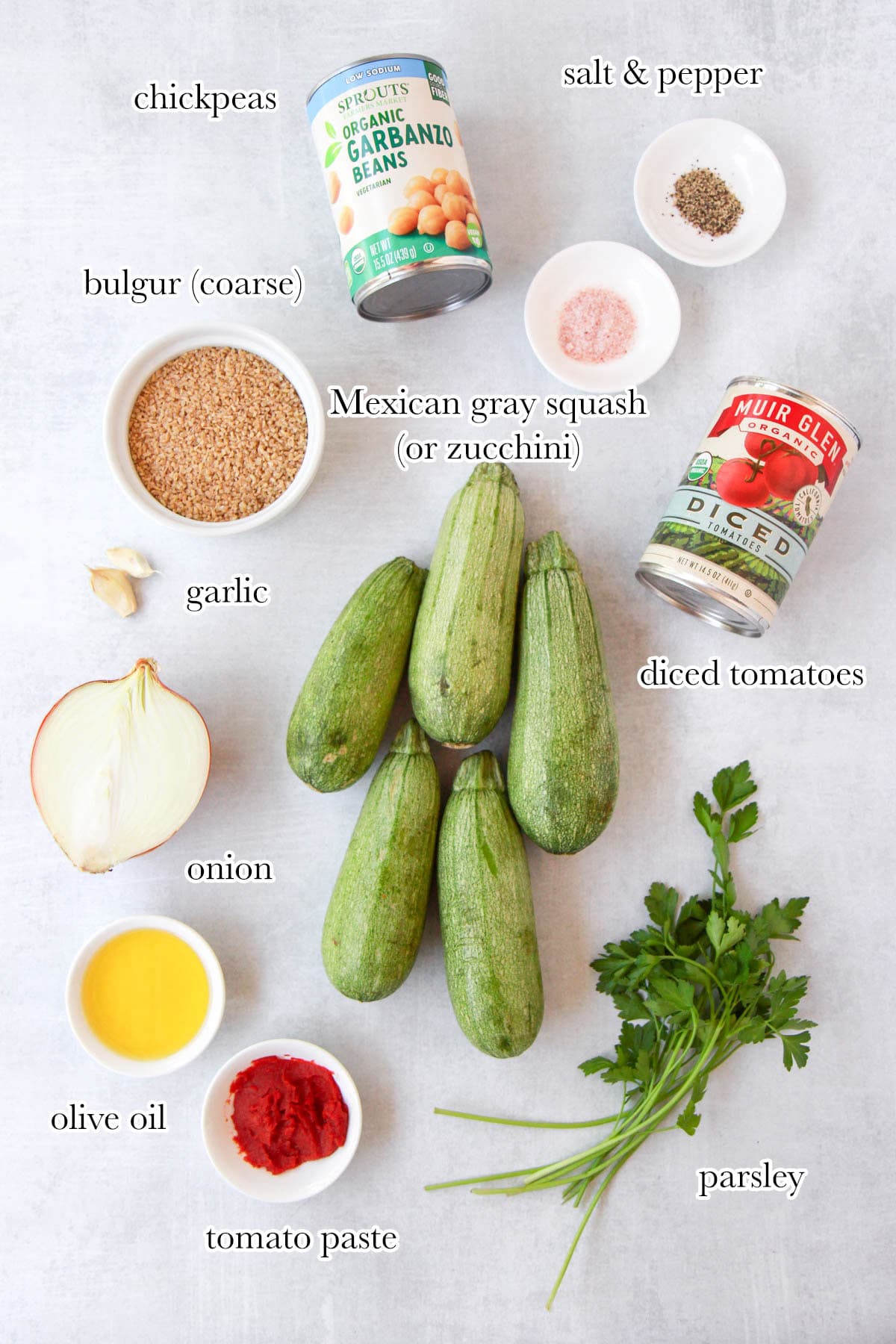 Ingredients needed for bulgur pilaf including coarse bulgur, chickpeas, tomatoes, squash, and more.