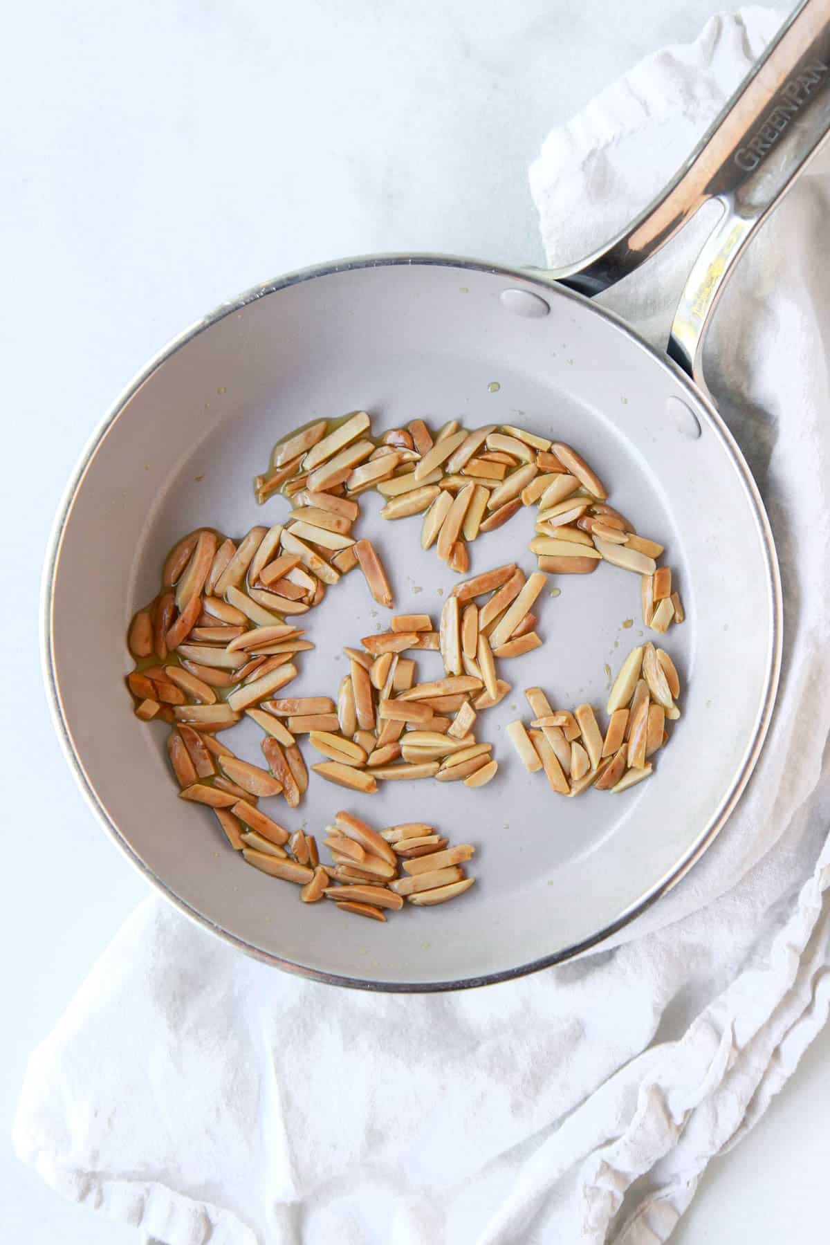 Slivered almonds, toasted in olive oil until golden.