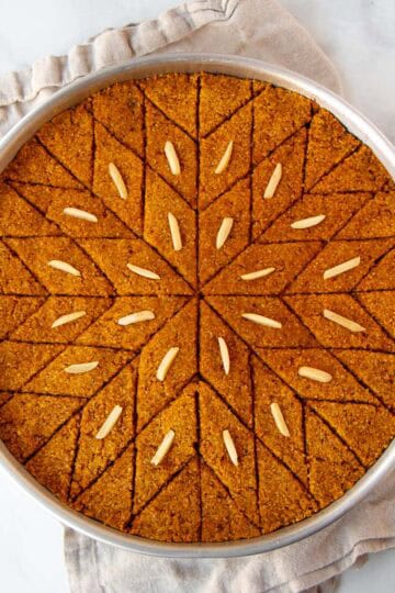 Flatlay image of baked pumpkin kibbeh, cropped square.